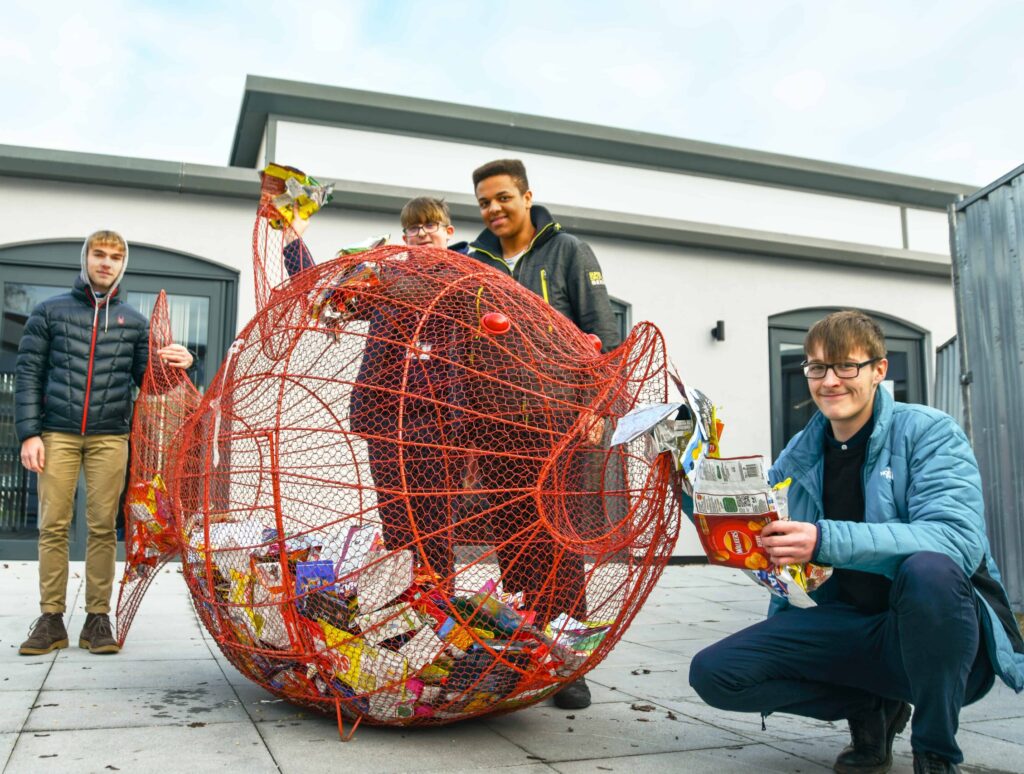 Crisp Packet Fish With Students of The Marches