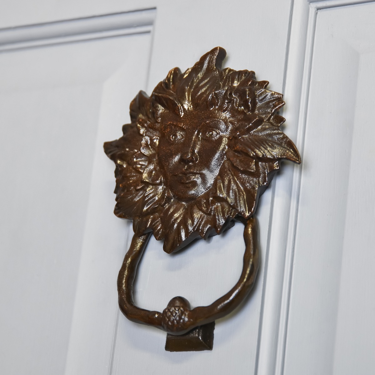 Green Maiden Door Knocker In Black Iron