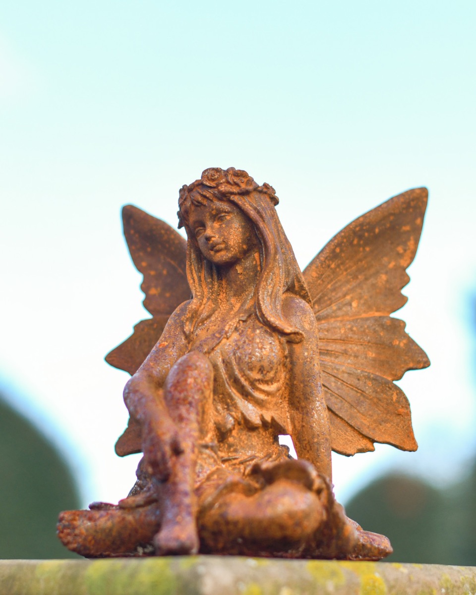 Rustic Cast Iron Daydreaming Fairy Sculpture