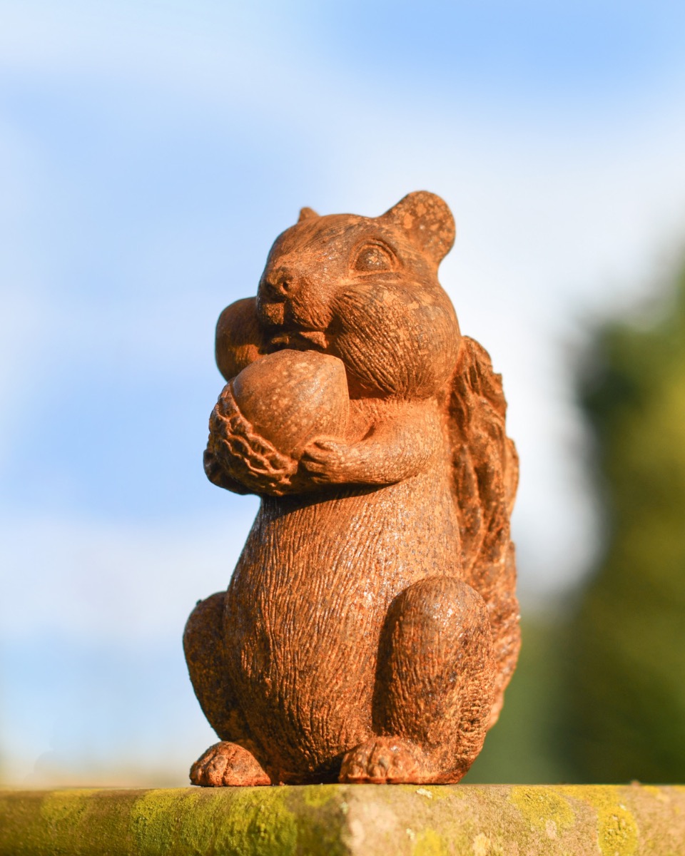 Rustic Cast Iron Munching Squirrel Sculpture