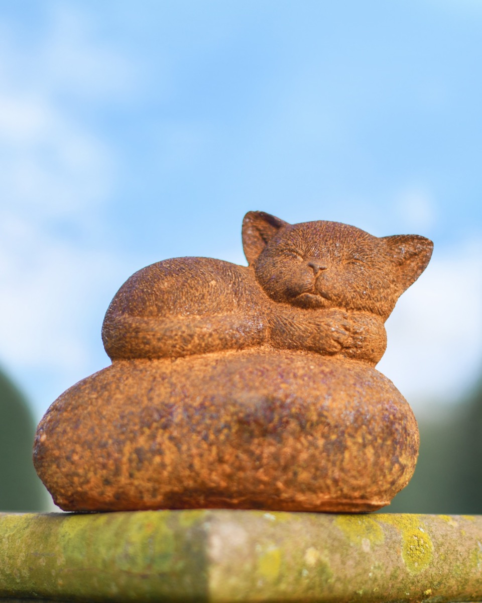 Rustic Cast Iron Sleeping Cat Sculpture