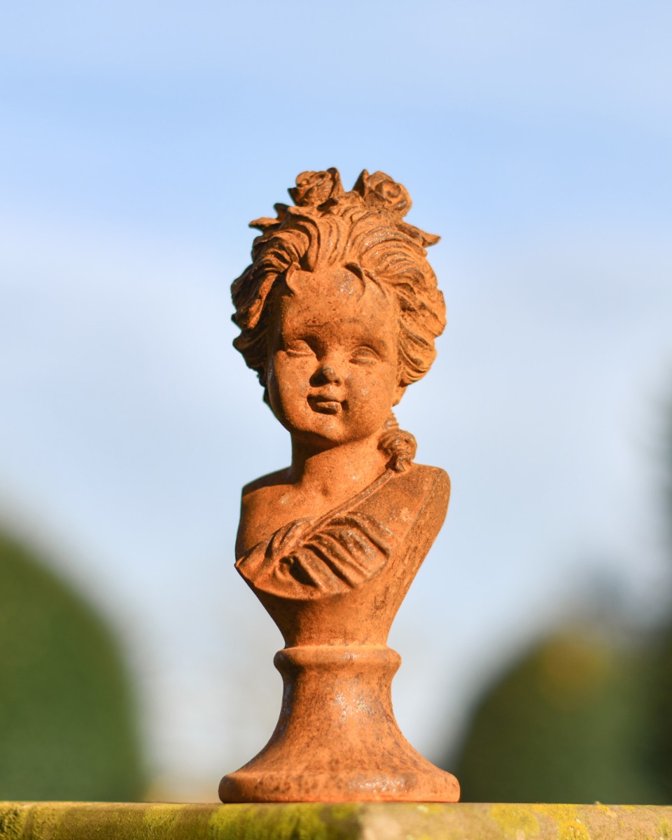 Rustic Cast Iron Young Deity Sculpture
