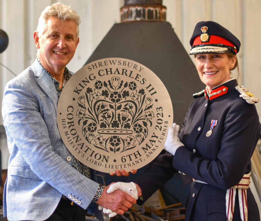 Clive Knowles and Anna Turner with the Shrewsbury Plaque cropped