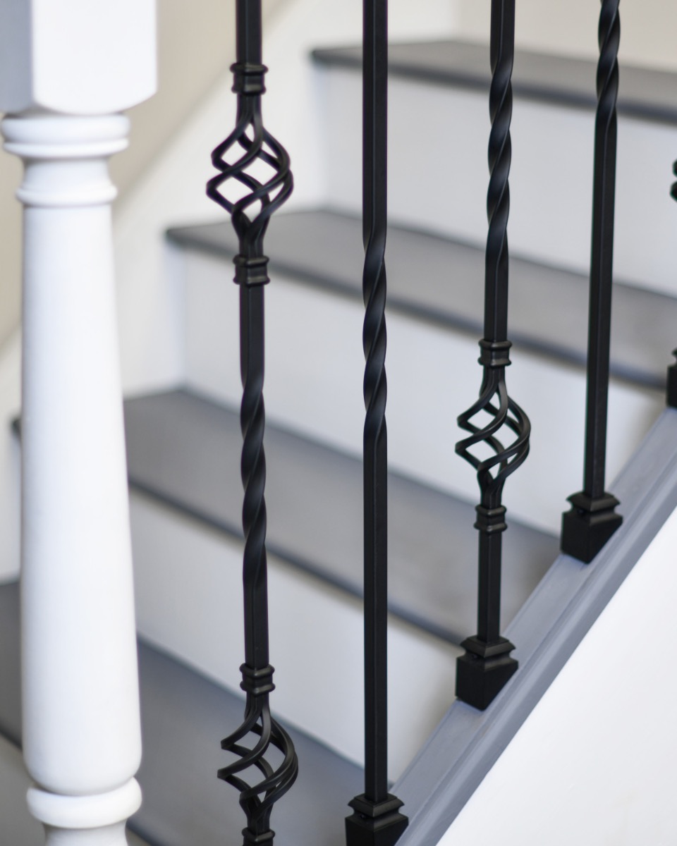 Set of 2 Steel "Albury & Redbridge" Stair Spindles in Matte Black (Pattern 7) at an Angle