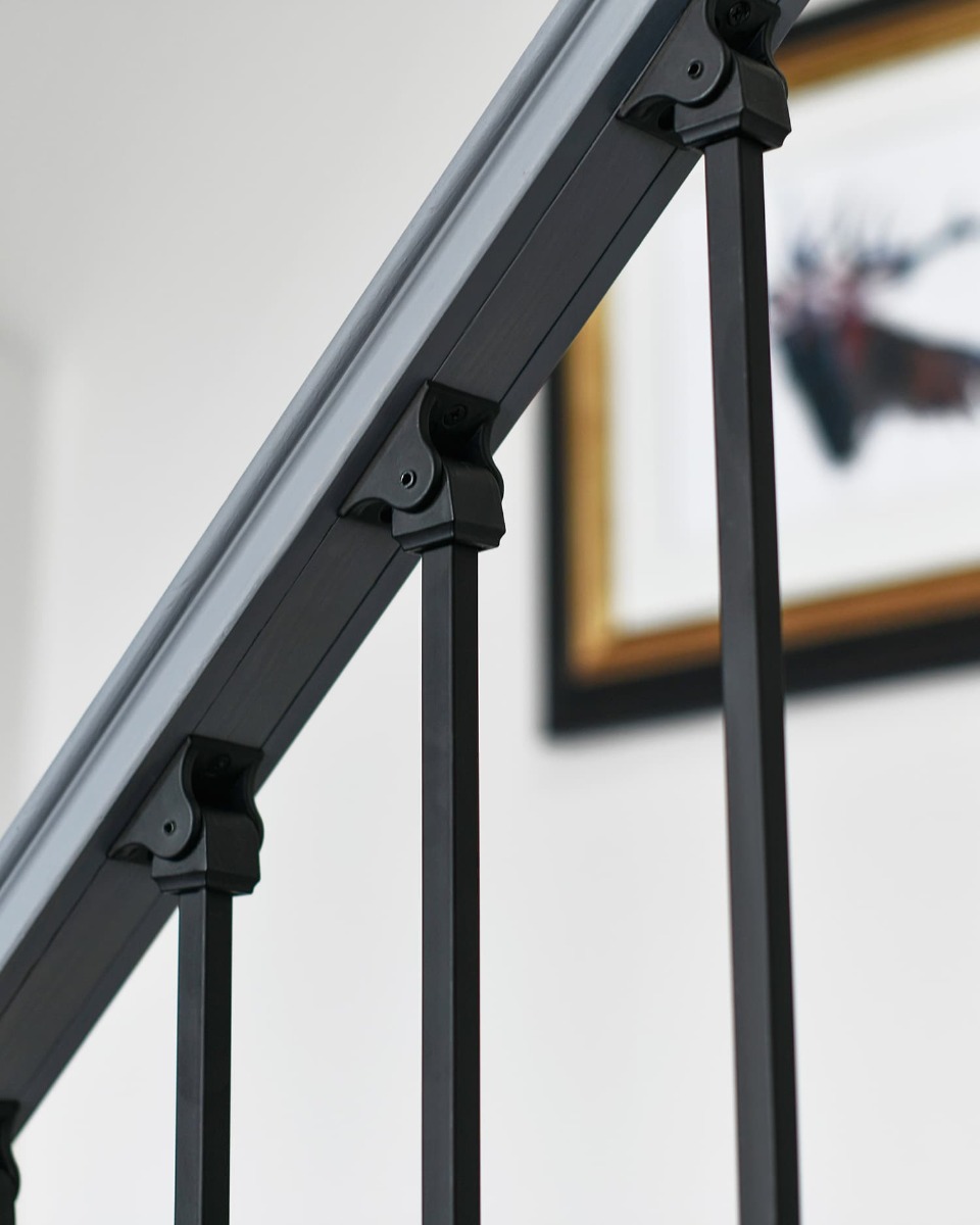 Close-Up of Adjustable Rake Brackets for Set of 2 "Glover & Needham" Stair Spindles in Matte Black (Pattern 16)