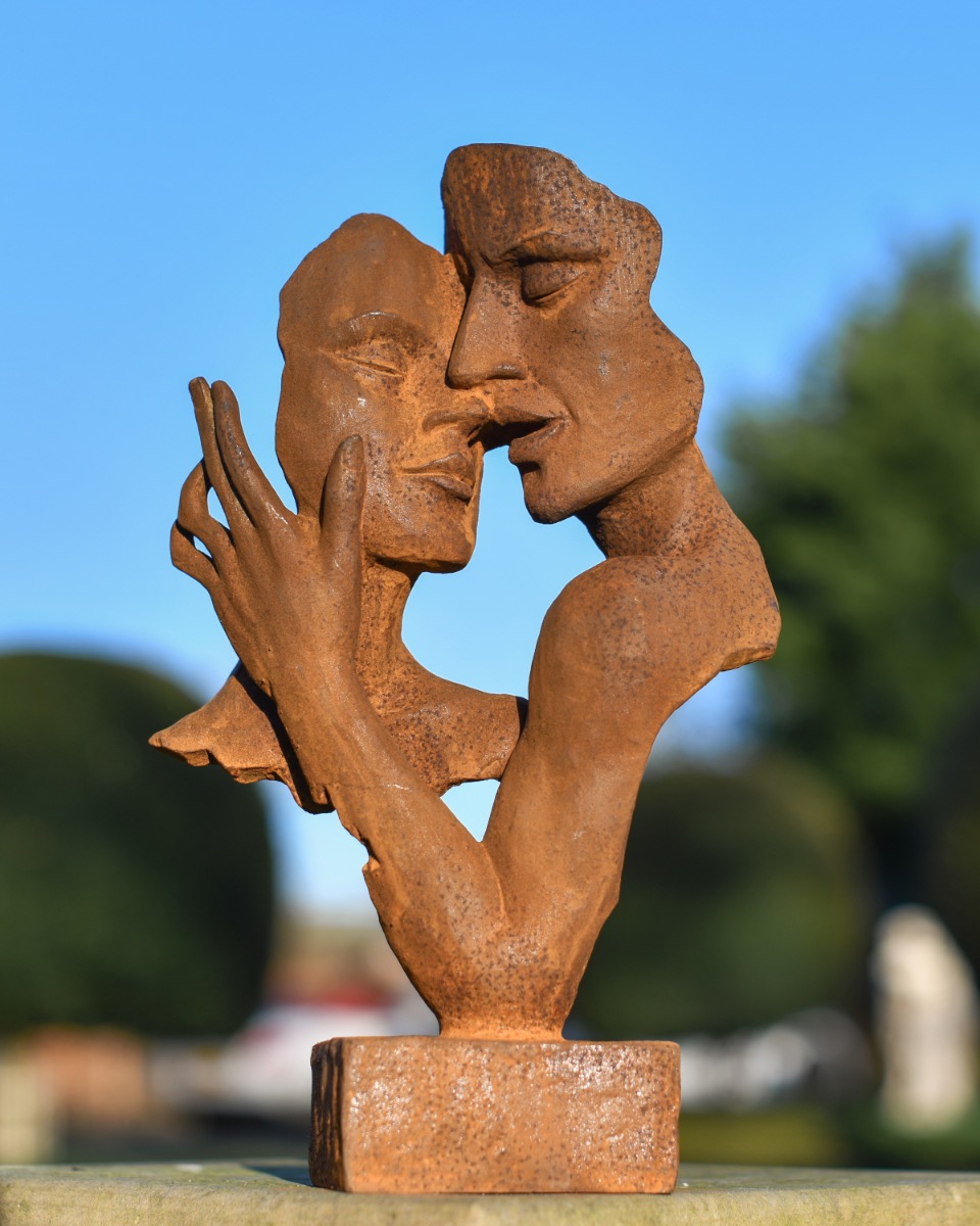 Abstract Faces Cast Iron Rustic Sculpture