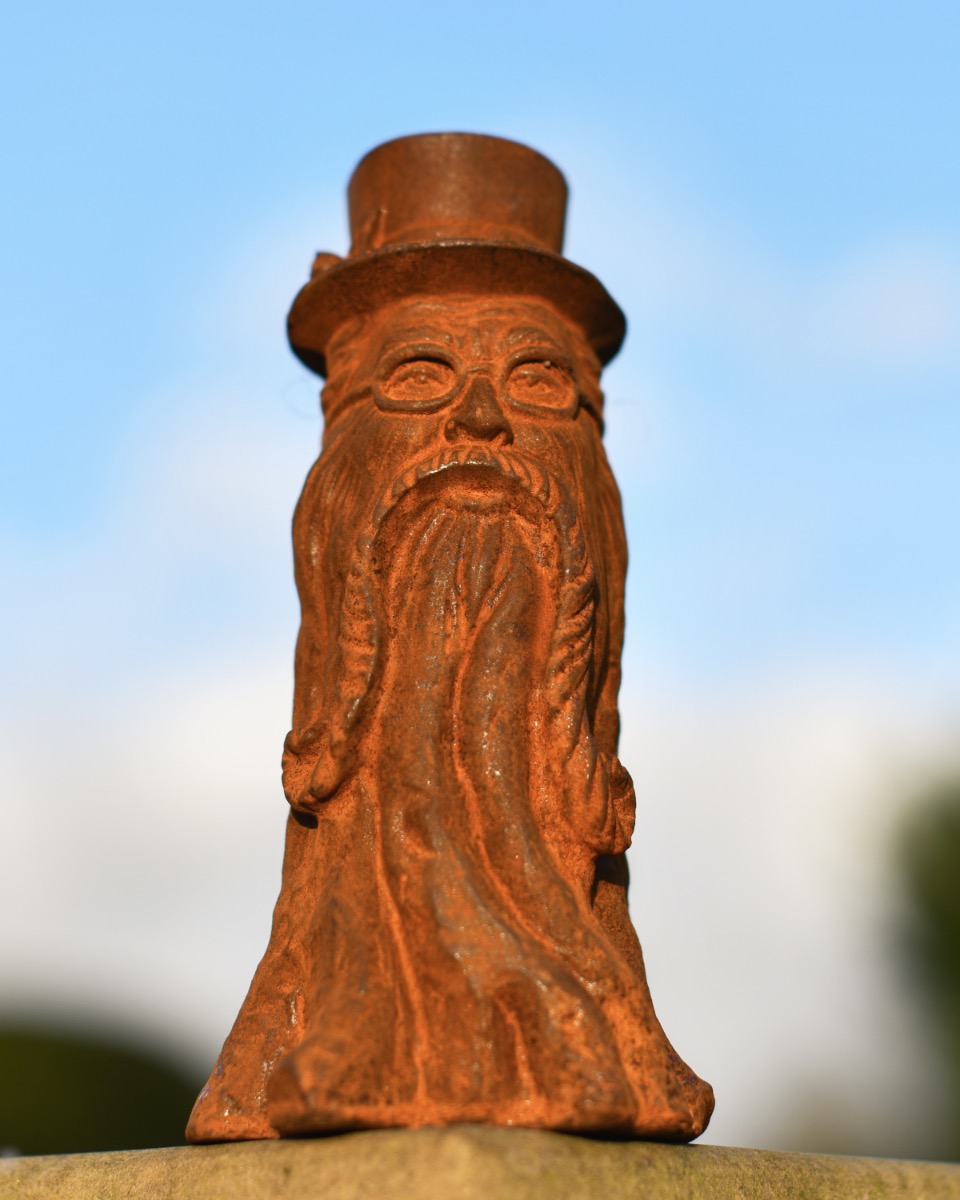 Rustic Cast Iron Man In A Tree Sculpture