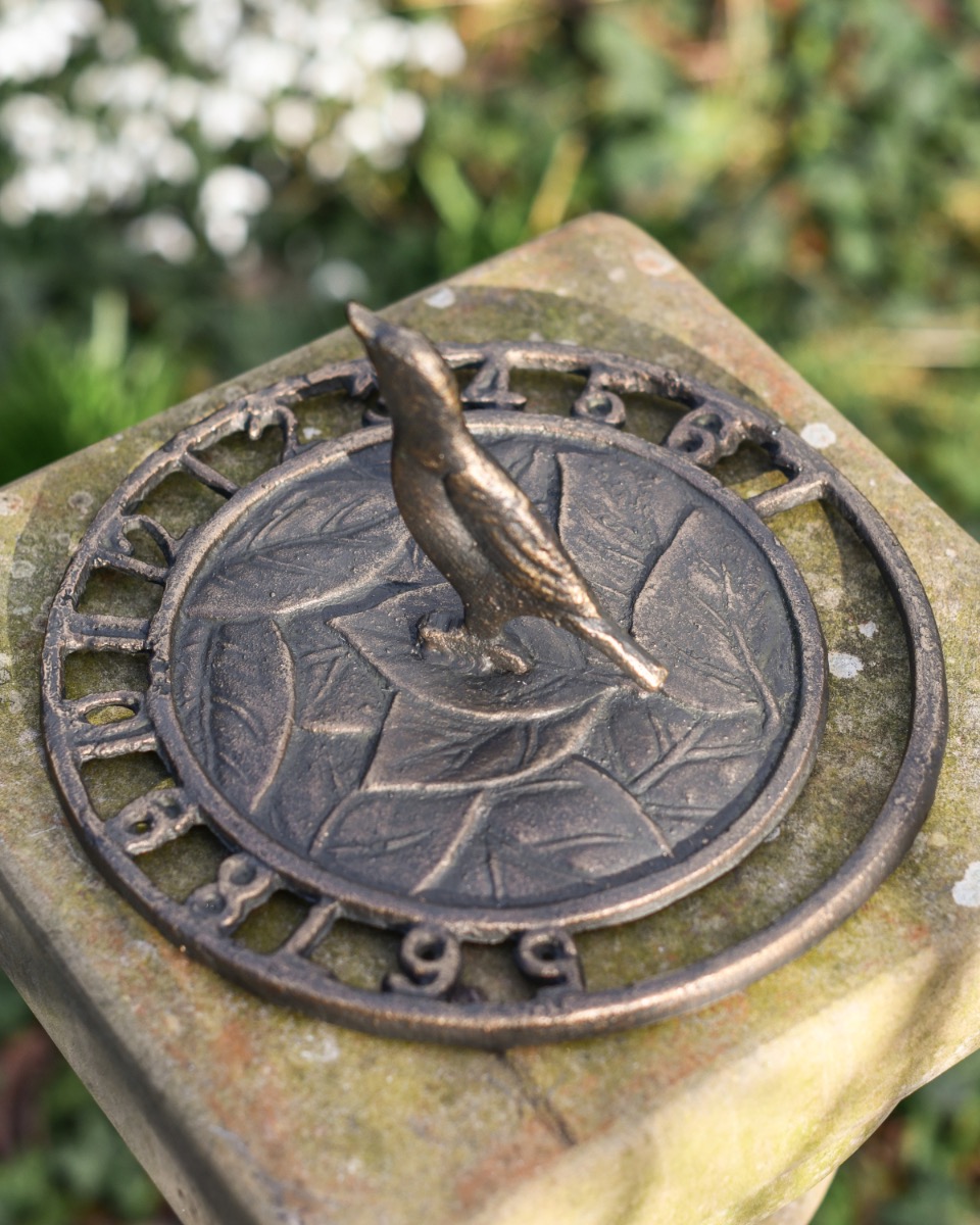 Aged Iron Bird Sundial