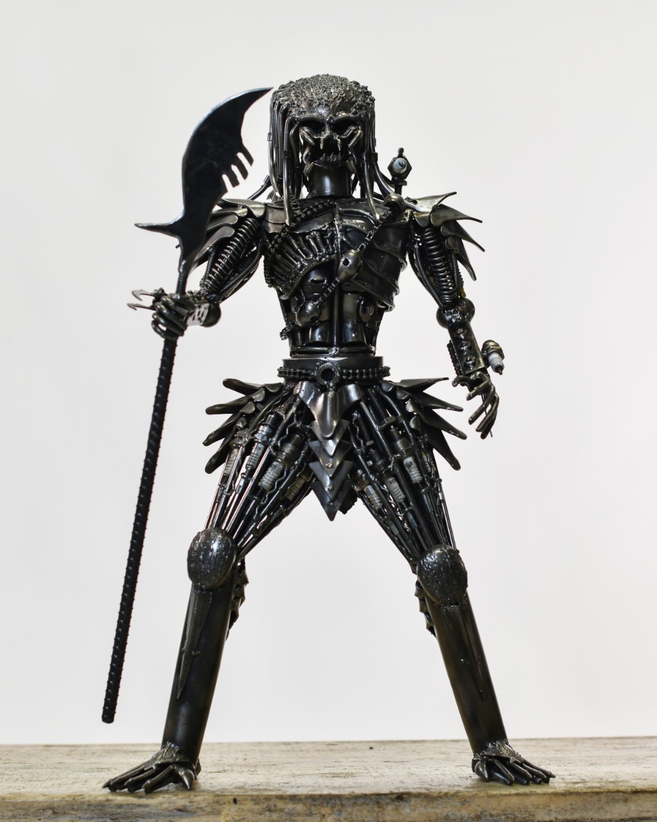 Recycled Metal Predator With Staff