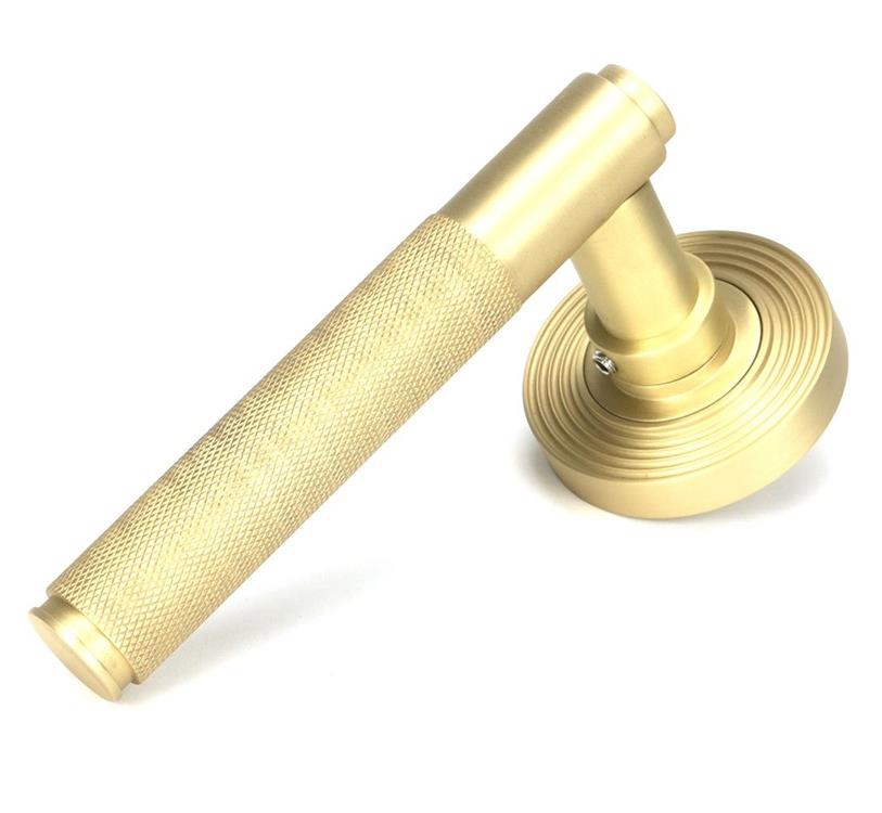 Sleek Satin Brass Beehive Door Handle On Rose Set