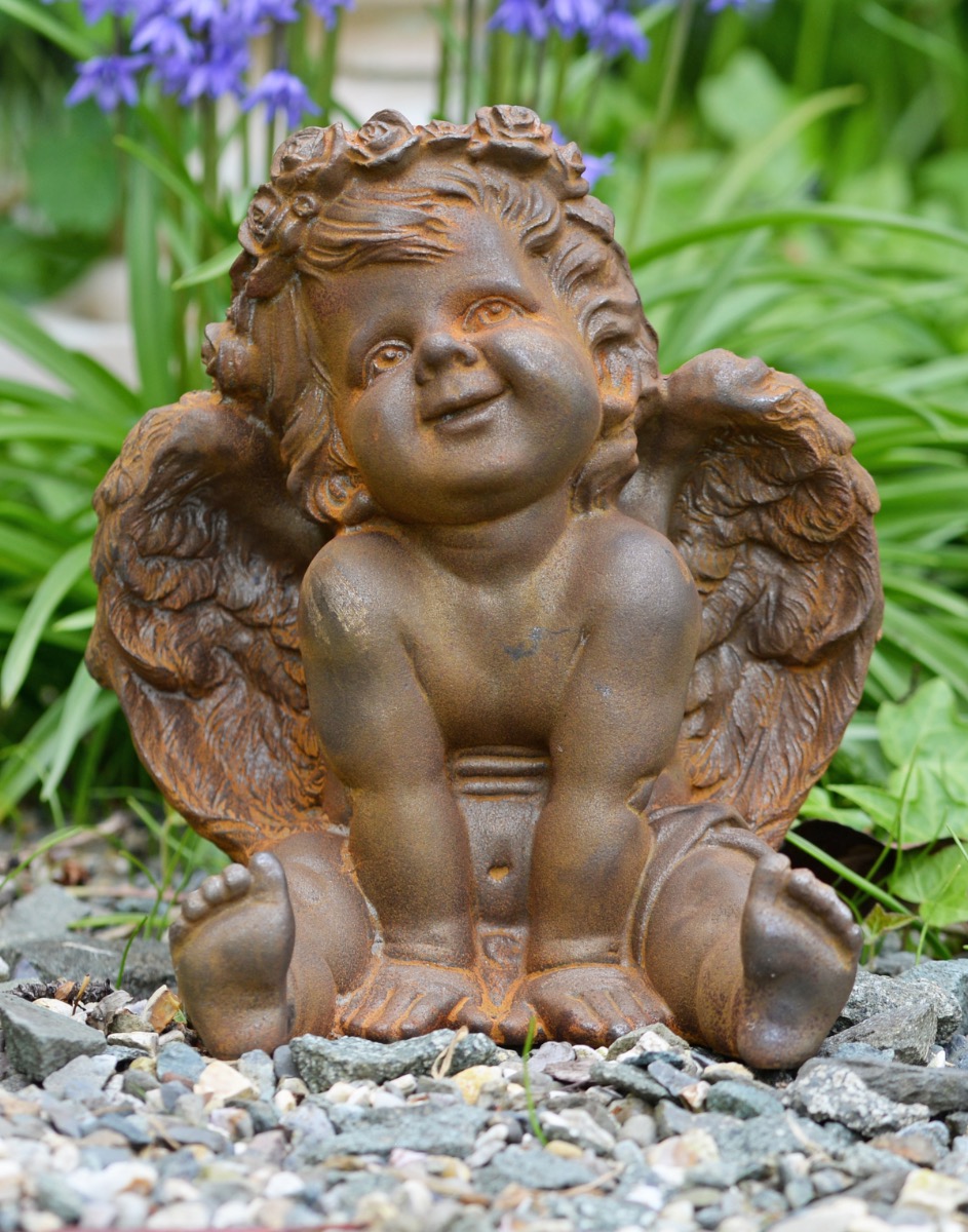 Rustic Cast Iron Cheerful Sitting Cherub Garden Sculpture