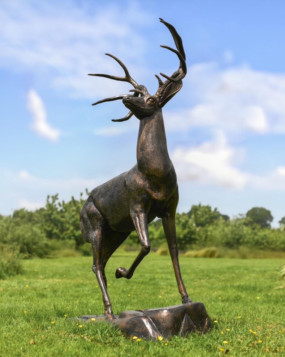 'Forest' Black & Gold Buck Climbing On Rocks Garden Sculpture