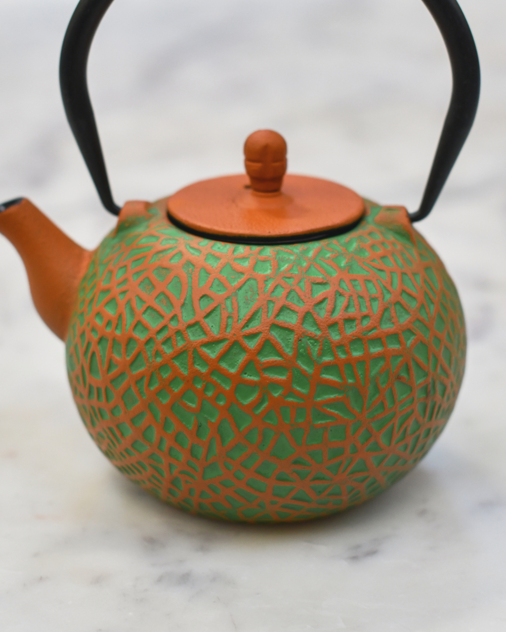Close Up Of The Colours On The Cast Iron 'Yubari Melon' Japanese Teapot
