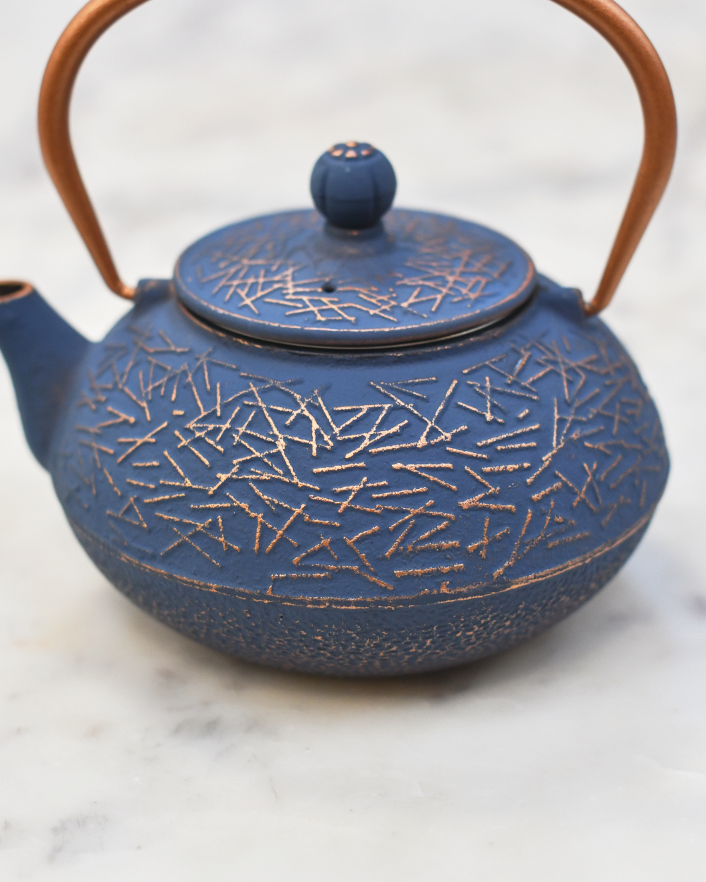Close Up Of The Design From The Cast Iron 'Matsubara' Japanese Teapot