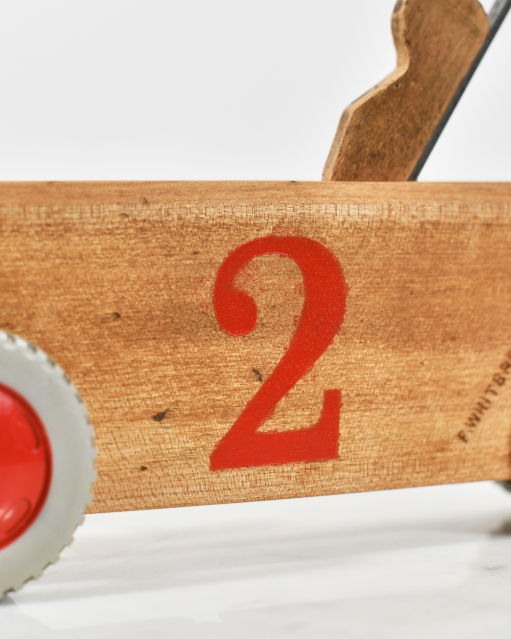 Close Up Of The Number On The Vintage Wooden Race Car