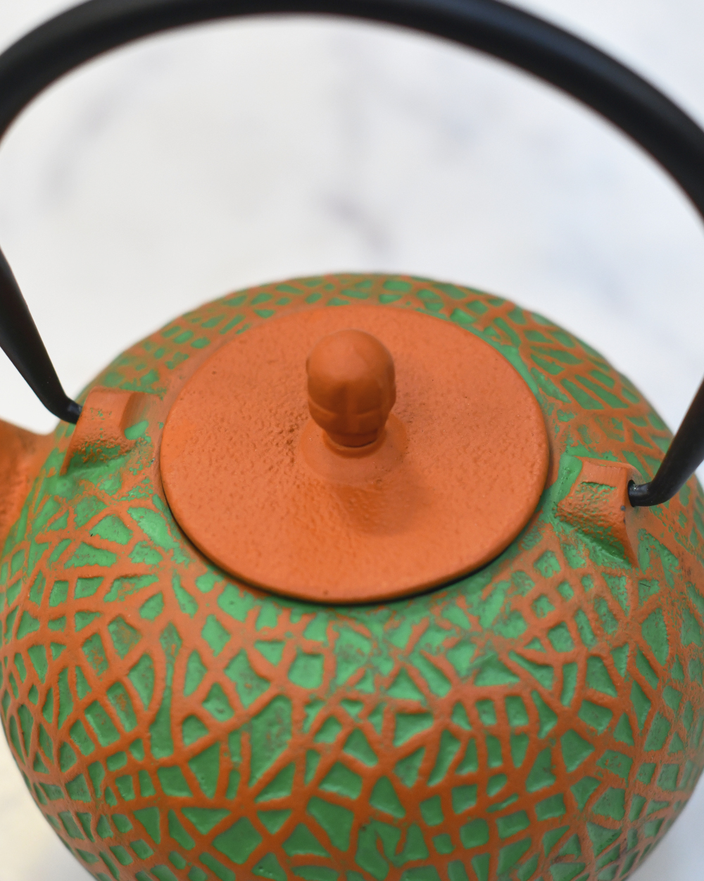 Cast Iron 'Yubari Melon' Japanese Vibrant Orange & Green Teapot Close Up Of The Lid