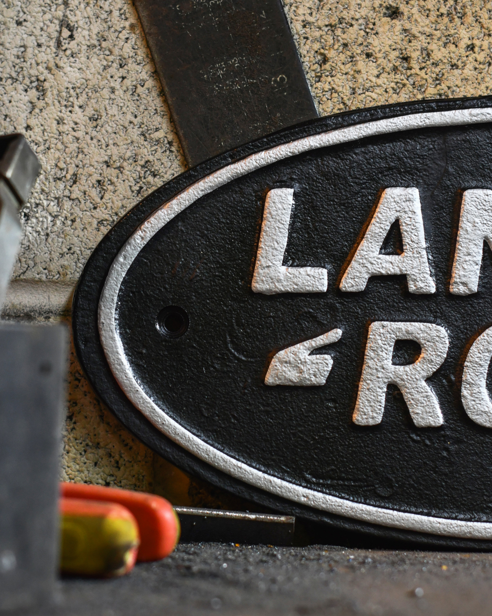 Close Up Of The Land Rover Cast Iron Automobilia Sign