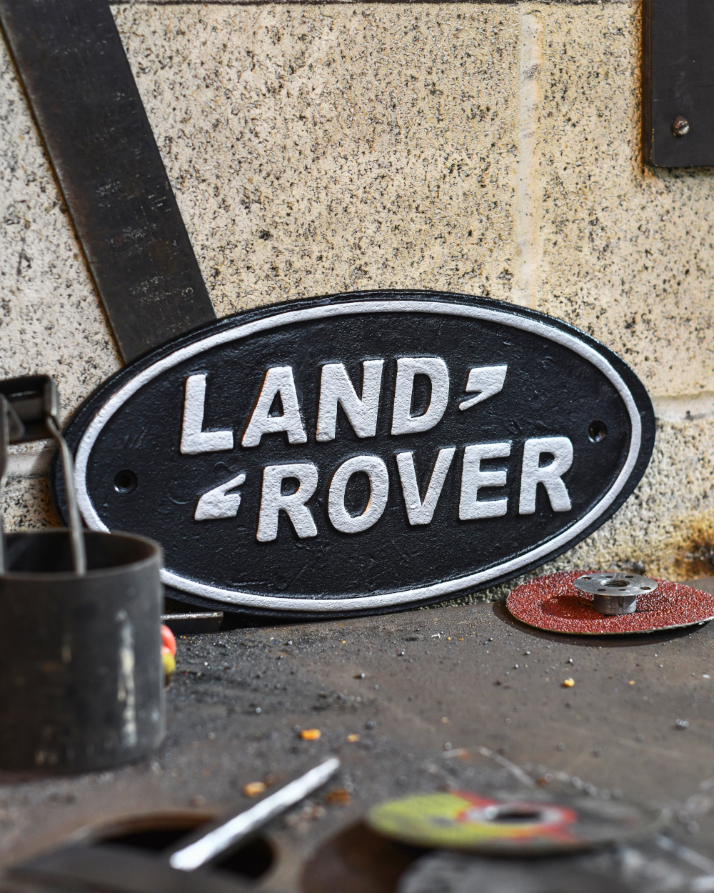 Land Rover Cast Iron Automobilia Sign In A Workshop