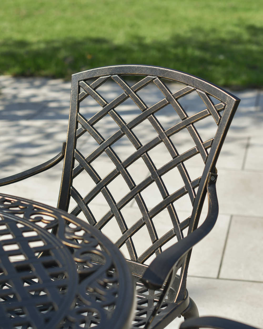 Outdoor Four Seater Bistro Set In Antique Bronze Back Of The Chair
