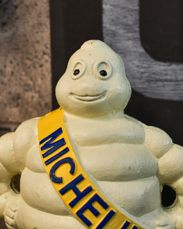 Cast Iron Hand Painted 'Michelin Man' Home Ornament Close Up