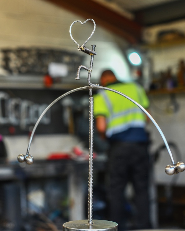 'Balancing Love' Scrap Metal Kinetic Balance Sculpture