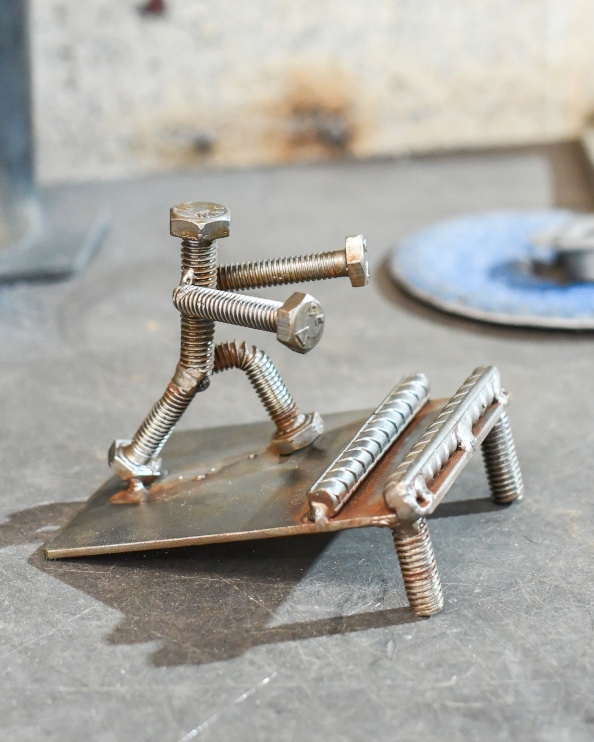 'The Sisyphus' Scrap Metal Art Phone Holder