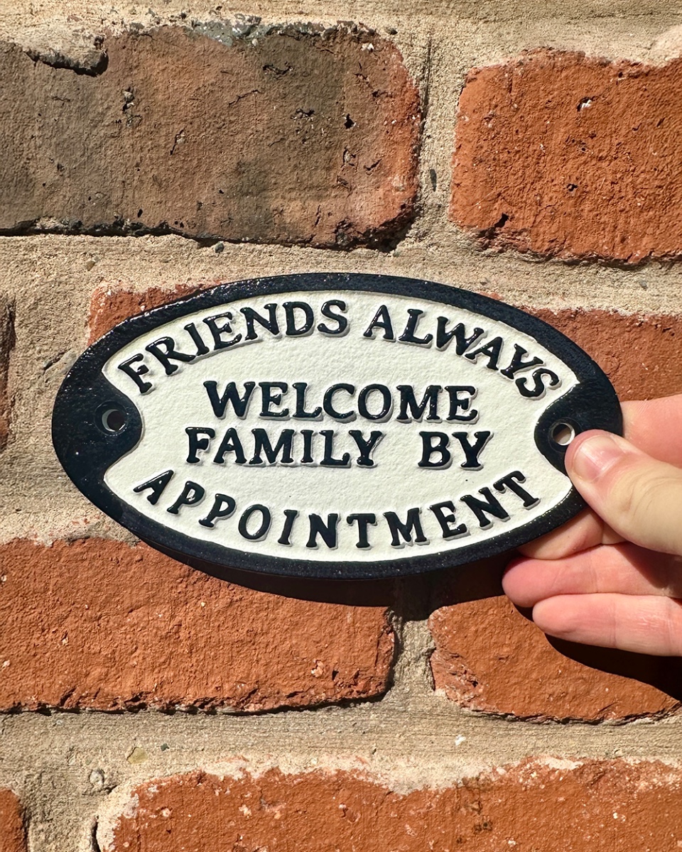 'Friends Always Welcome' Cast Iron Humour Sign